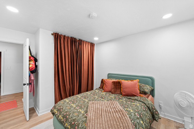 257 200 South Provo, UT 84606 - Photo 16 of 40 Bedroom featuring light wood-style floors and recessed lighting