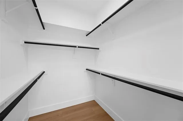 a view of small space with empty racks on the wall