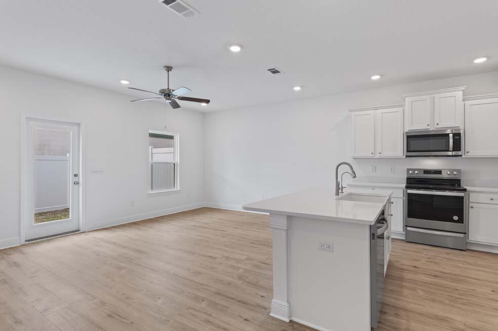 17 Phoenix Street Santa Rosa Beach, FL 32459 - Photo 3 of 26 a view of a kitchen with electric appliances