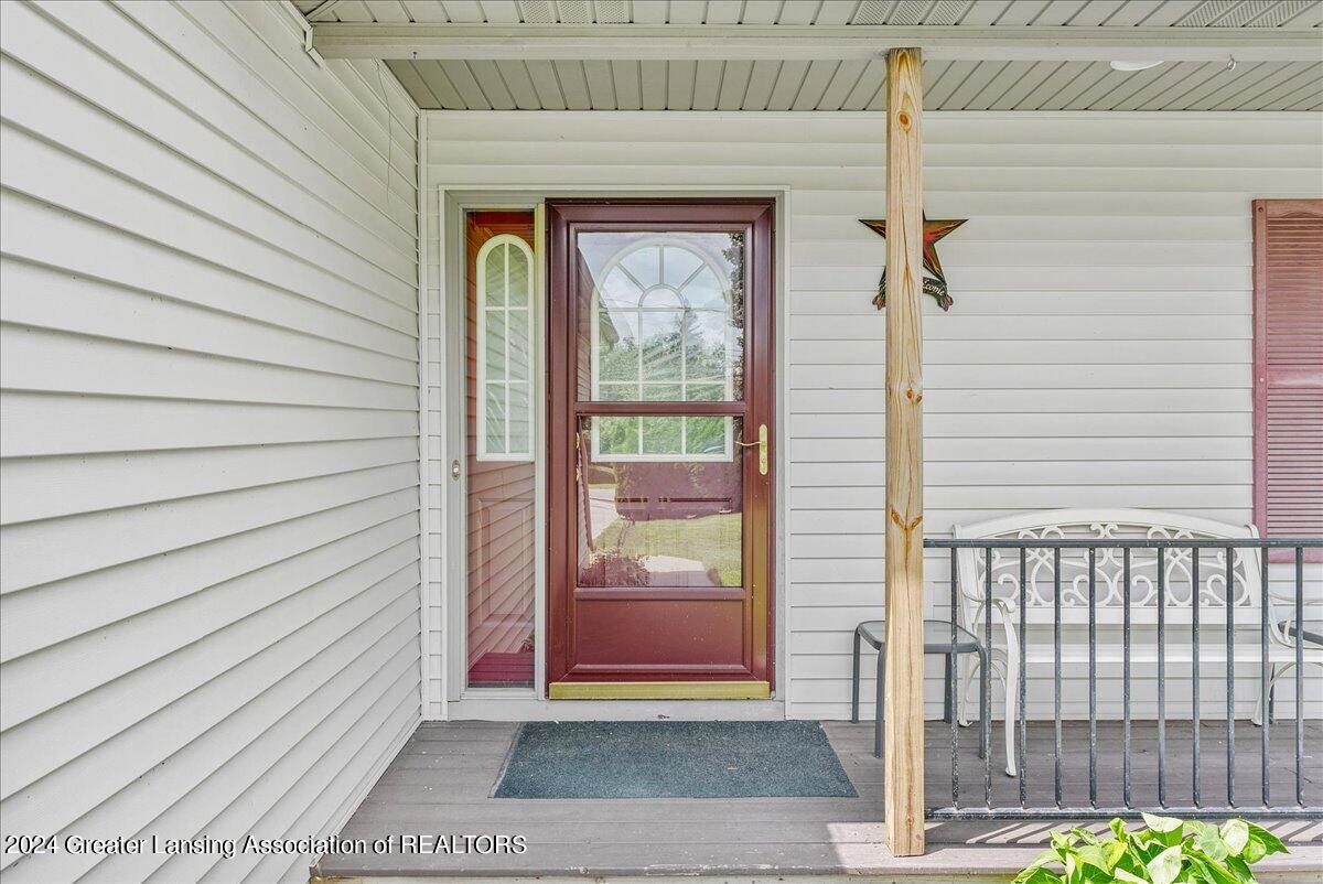 1645 North Aurelius Road Holt, MI 48842 - Photo 3 of 33 Front door