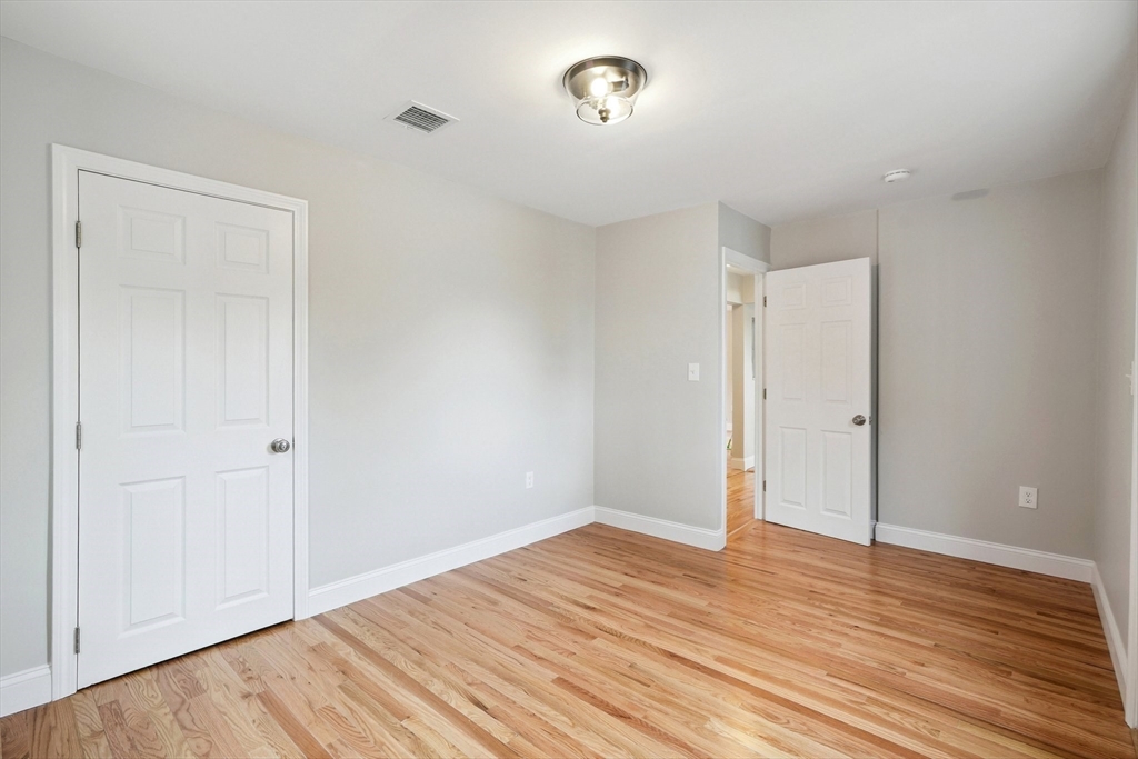 49 Jamaica Street, Unit 2 Boston, MA 02130 - Photo 7 of 19 wooden floor in an empty room