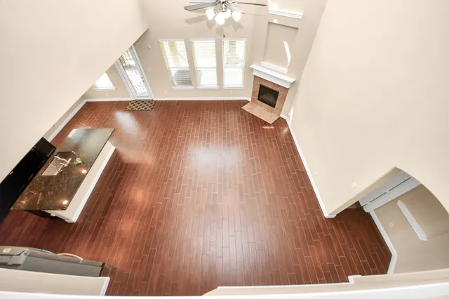 a view of an entryway with wooden floor