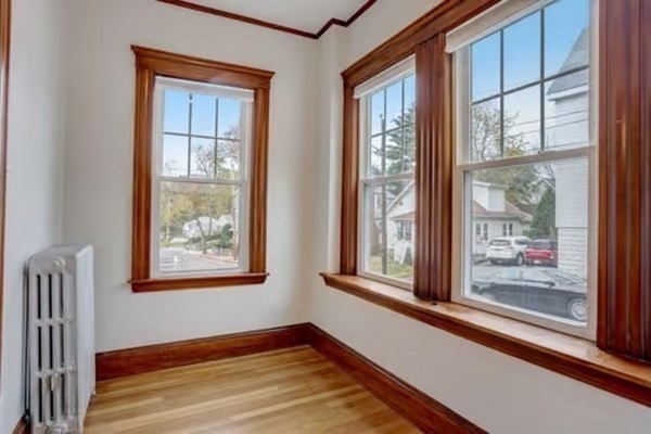42 Lagrange Street, Unit 1 Boston, MA 02132 - Photo 12 of 29 a view of an empty room with a window