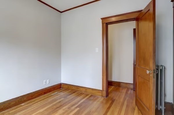 42 Lagrange Street, Unit 1 Boston, MA 02132 - Photo 18 of 29 a view of a small space with wooden floor and a hallway
