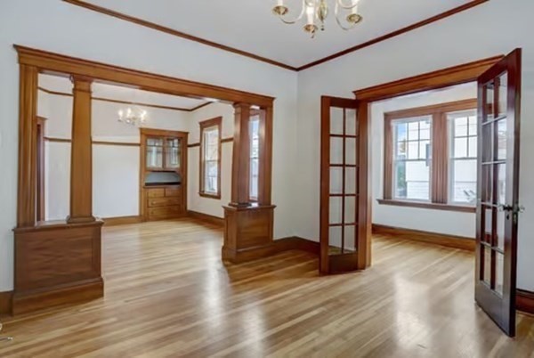 42 Lagrange Street, Unit 1 Boston, MA 02132 - Photo 2 of 29 a view of an entryway with wooden floor and door