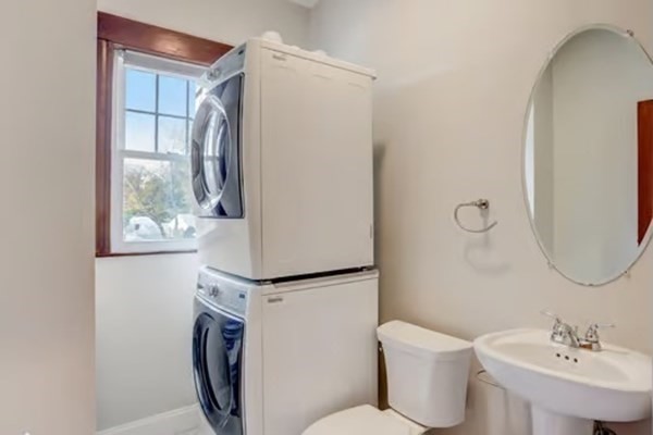 42 Lagrange Street, Unit 1 Boston, MA 02132 - Photo 23 of 29 a bathroom with a toilet sink and mirror