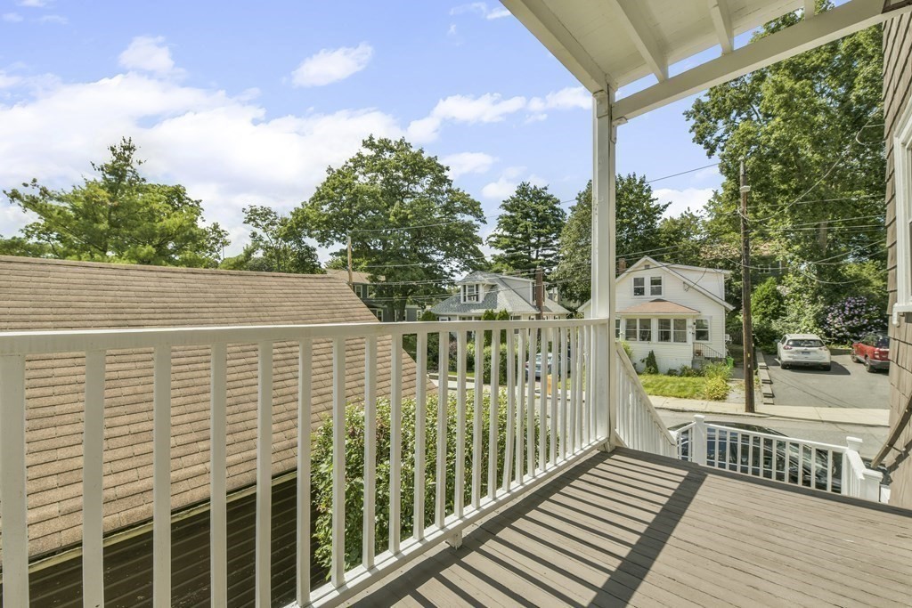 42 Lagrange Street, Unit 1 Boston, MA 02132 - Photo 24 of 29 a view of a balcony with wooden floor