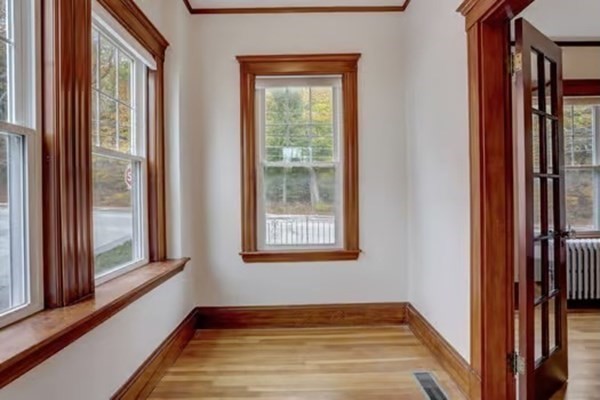 42 Lagrange Street, Unit 1 Boston, MA 02132 - Photo 4 of 29 a view of a room that has a window in it