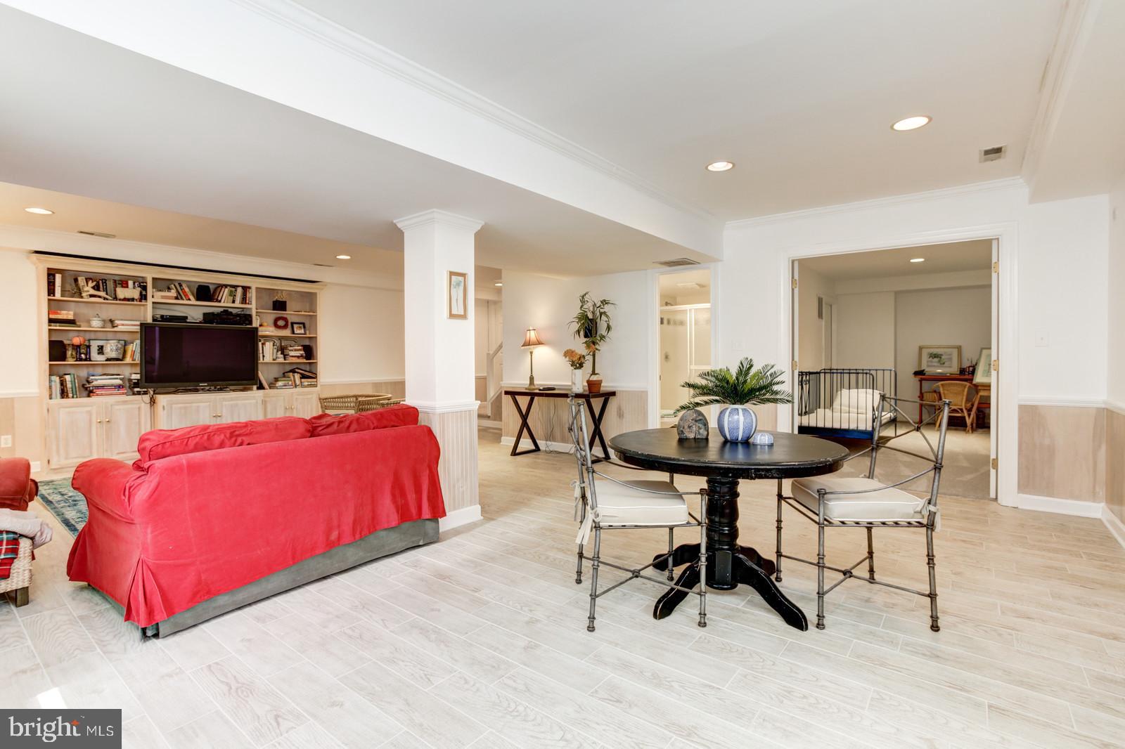 3407 Hidden River View Road Annapolis, MD 21403 - Photo 26 of 47 ADDITIONAL SEATING AREA IN LOWER LEVEL