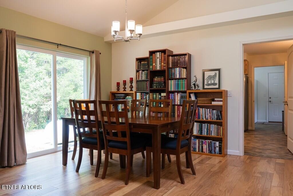 1518 Cummingsville And Sparkman Road Doyle, TN 38559 - Photo 15 of 58 a view of a dining room with furniture wooden floor and chandelier
