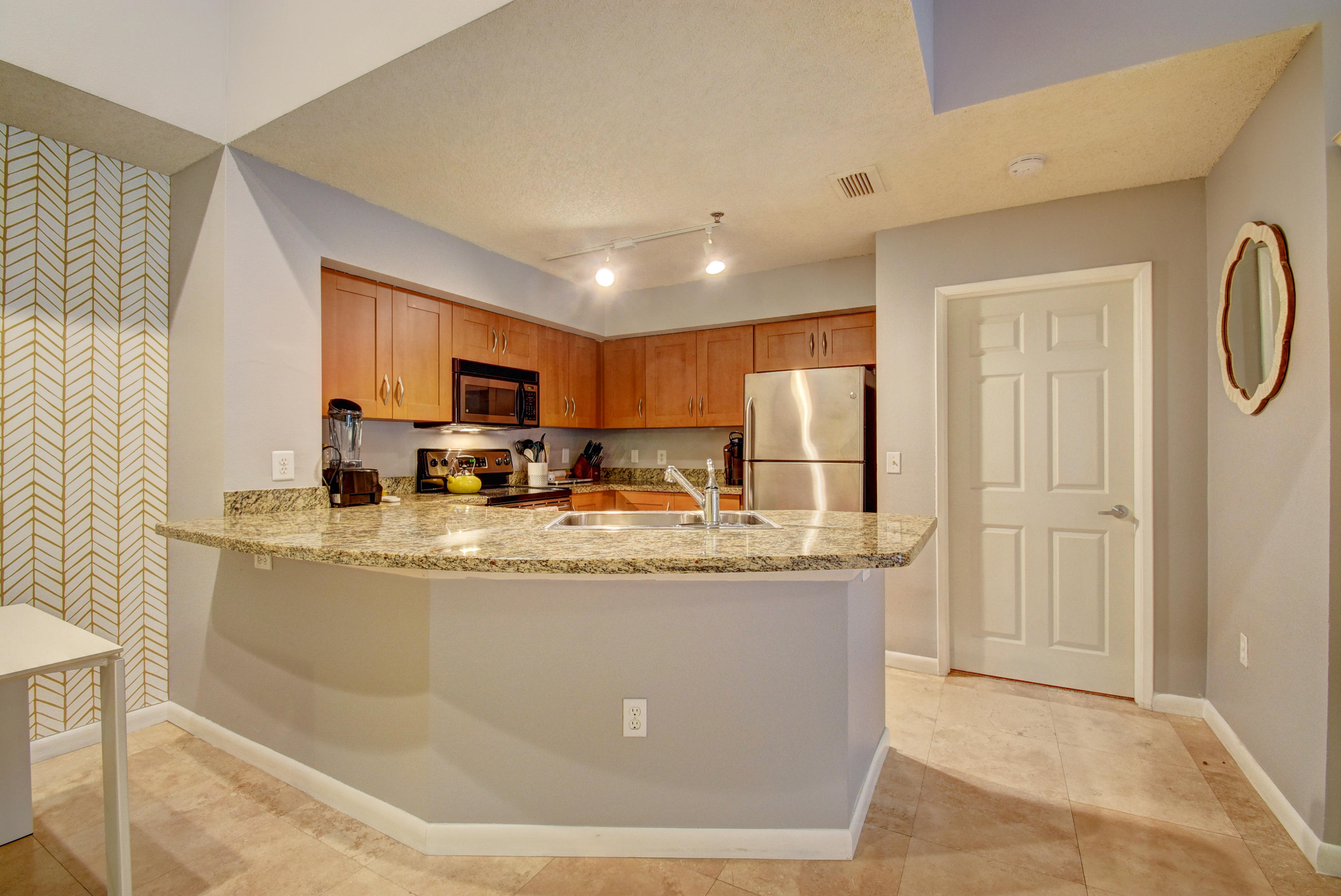 3133 Clint Moore Road, Unit 204 Boca Raton, FL 33496 - Photo 9 of 23 Kitchen with spacious counter