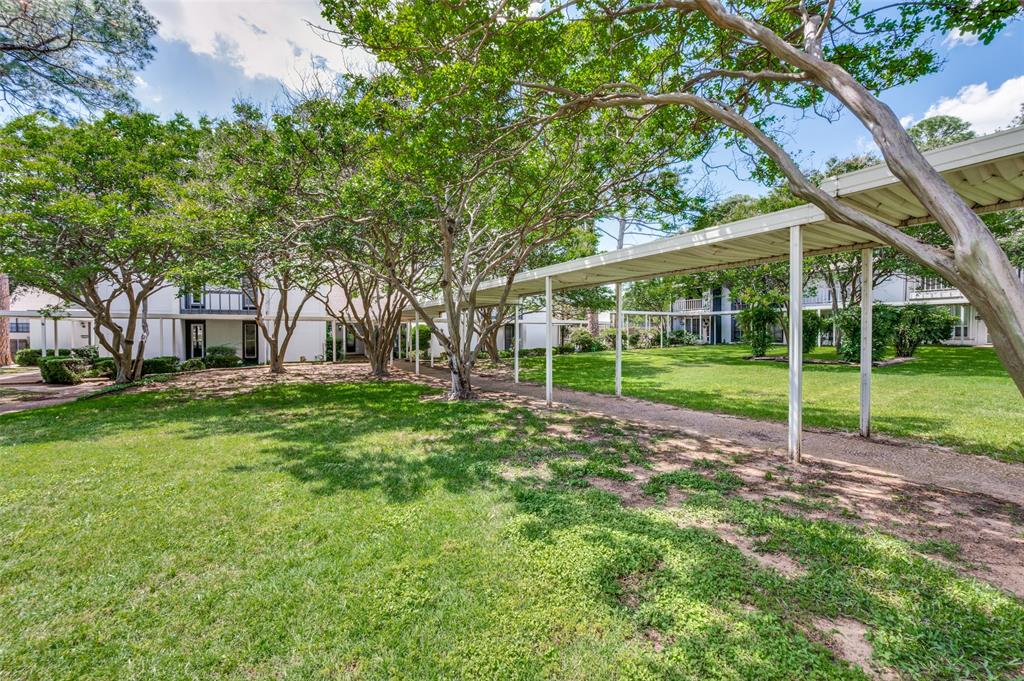 412 Hollyhill Lane Denton, TX 76205 - Photo 1 of 15 a view of a house with backyard and a tree