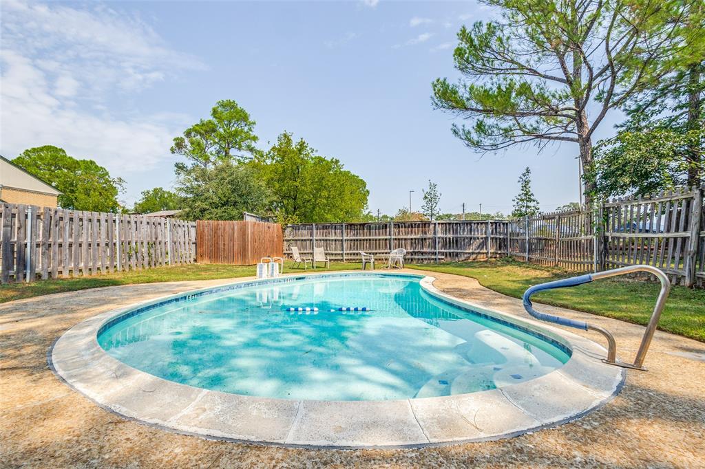 412 Hollyhill Lane Denton, TX 76205 - Photo 15 of 15 a view of a swimming pool with a lounge chairs