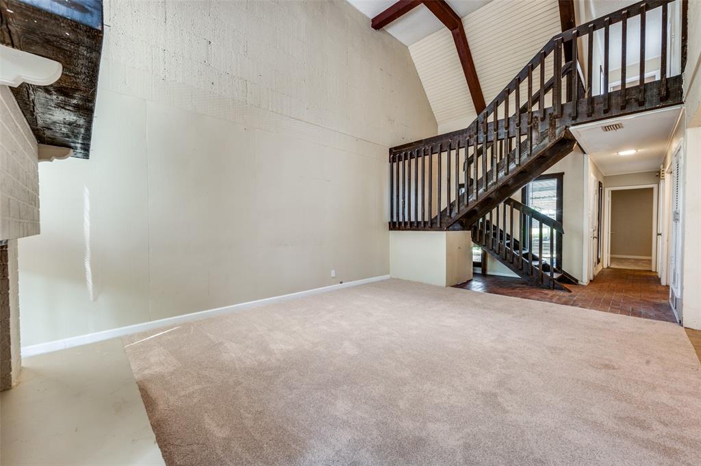 412 Hollyhill Lane Denton, TX 76205 - Photo 5 of 15 a view of an entryway with wooden floor