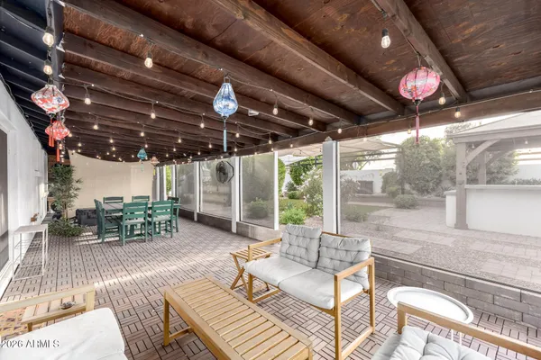a outdoor space with lots of tables a chairs and a table