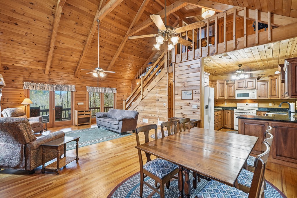 238 Cedar Ridge Road Cherry Log, GA 30522 - Photo 6 of 22 a outdoor space with lots of furniture and wooden floor