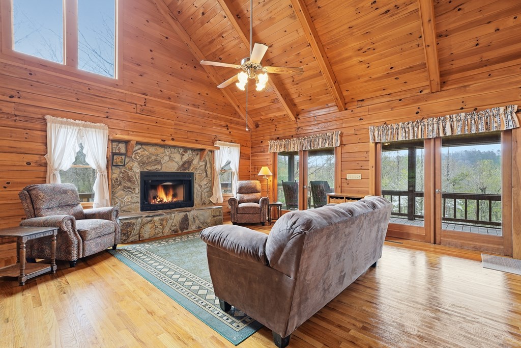 238 Cedar Ridge Road Cherry Log, GA 30522 - Photo 10 of 22 a living room with furniture and a fireplace