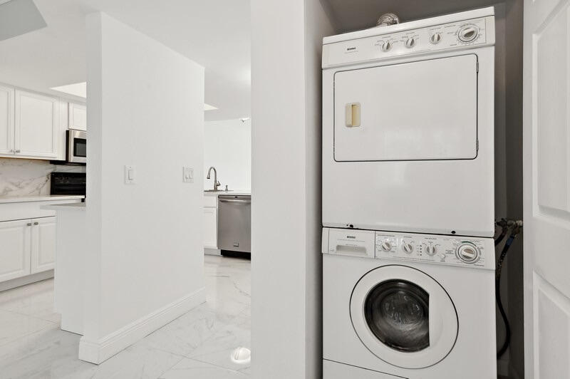 9500 Southwest 3rd Street, Unit 103 Boca Raton, FL 33428 - Photo 13 of 15 13_9500SW3rdSt_Unit103_44_LaundryRoom_Fl