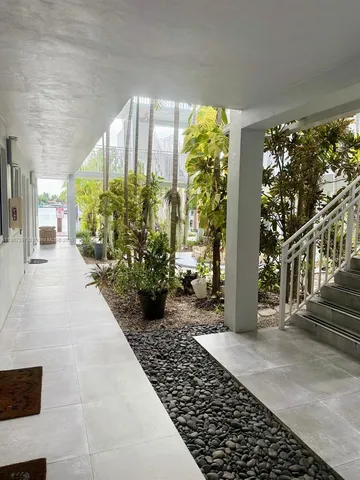 a view of a back yard of the house