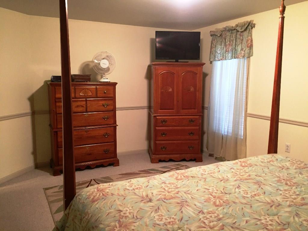 170 Kelleytown Road Bernard, ME 04612 - Photo 23 of 33 A big, airy bedroom