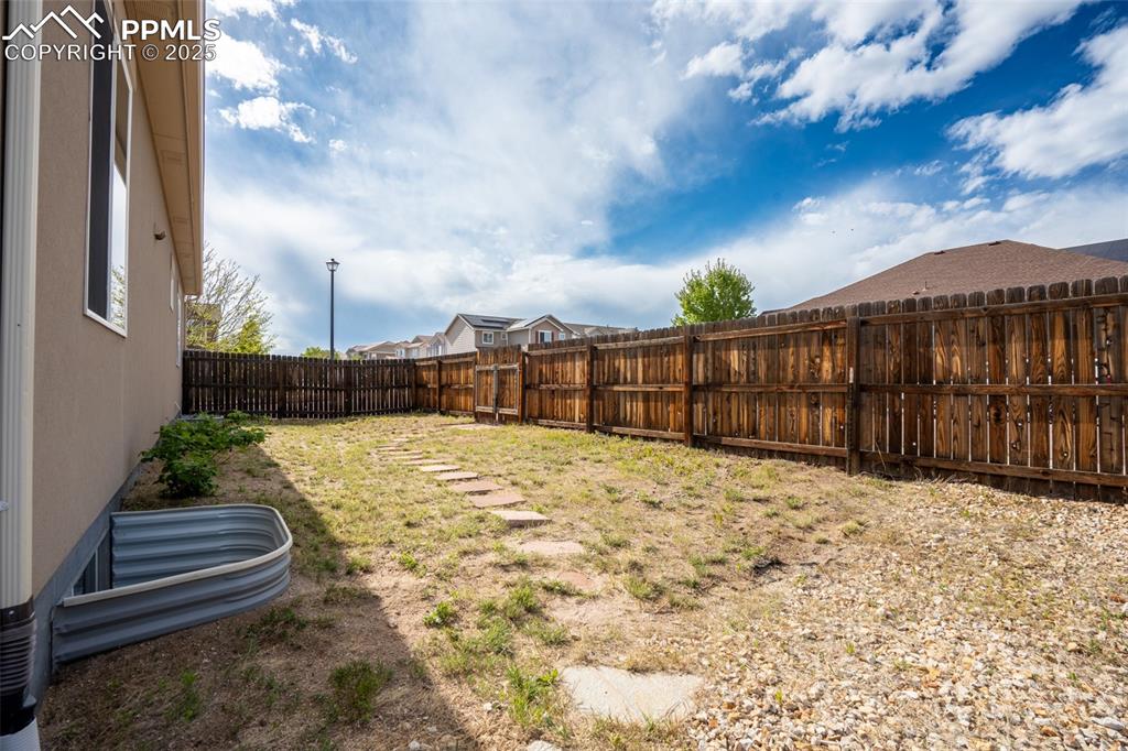 1985 Reed Grass Way Colorado Springs, CO 80915 - Photo 32 of 37 a view of a backyard