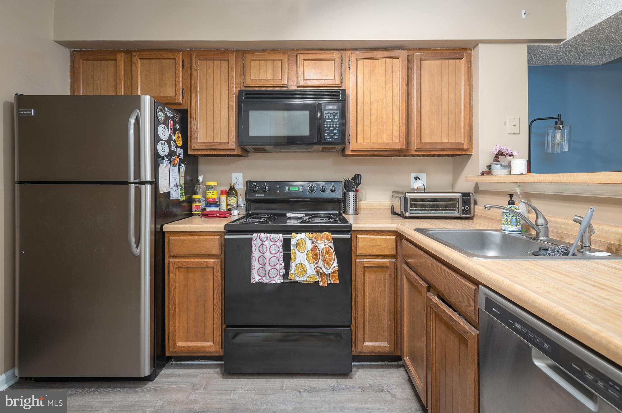 10803 Amherst Avenue, Unit D Silver Spring, MD 20902 - Photo 6 of 16 kitchen with updated appliances