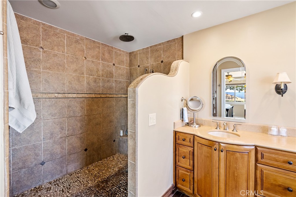 2255 Lothar Lane Templeton, CA 93465 - Photo 18 of 41 a bathroom with a double vanity sink and a mirror