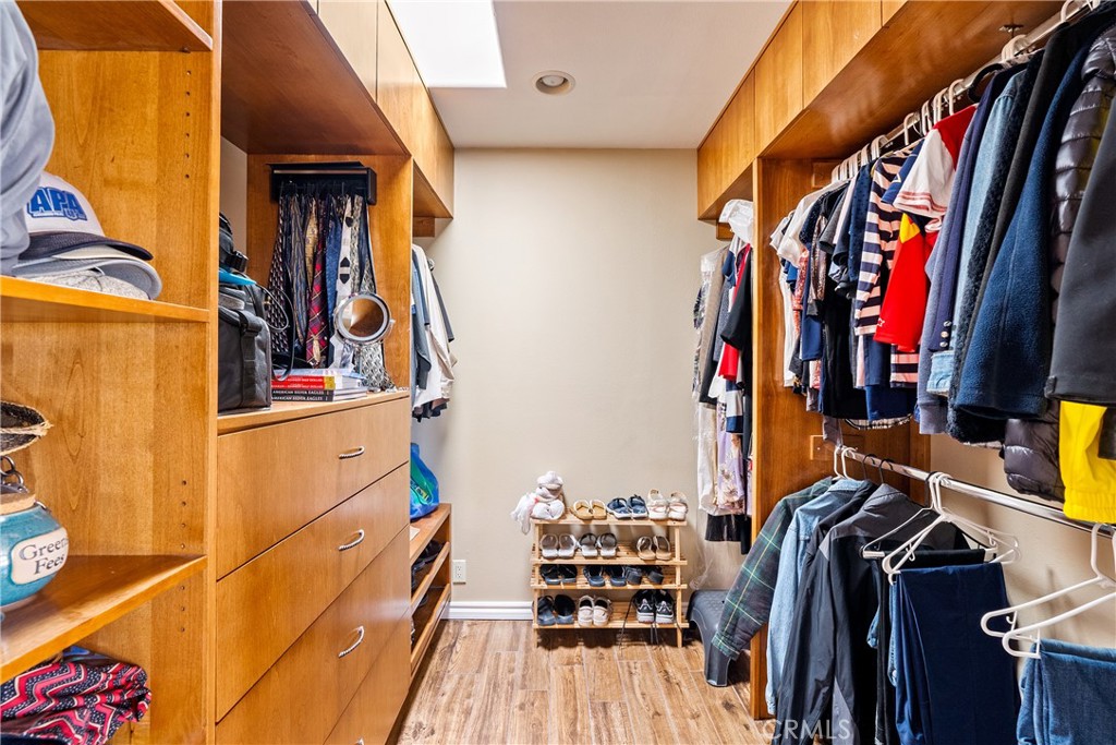 2255 Lothar Lane Templeton, CA 93465 - Photo 19 of 41 a view of walk in closet with clothes and shoes