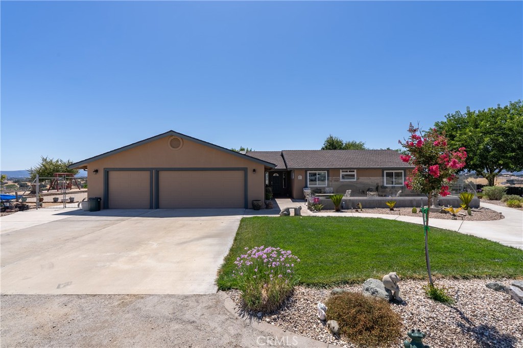 2255 Lothar Lane Templeton, CA 93465 - Photo 2 of 41 a front view of house with a garden
