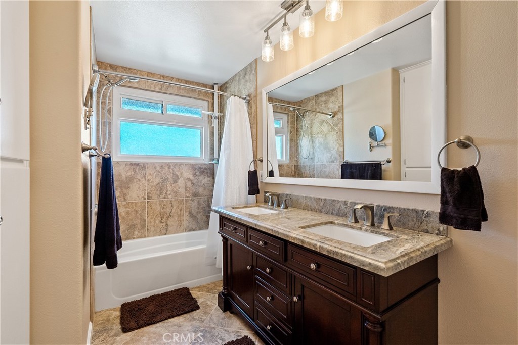 2255 Lothar Lane Templeton, CA 93465 - Photo 22 of 41 a bathroom with a sink and a mirror