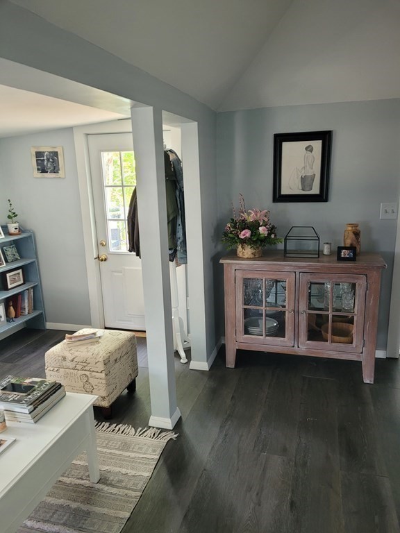21 Thompson Road, Unit 21 Bourne, MA 02532 - Photo 8 of 24 a living room with furniture and a flat screen tv
