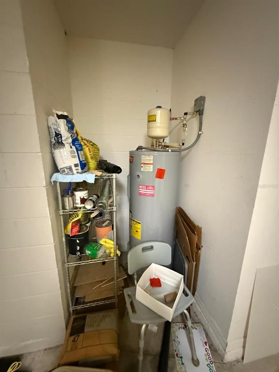 622 Samuel Place Davenport, FL 33837 - Photo 29 of 64 a room with storage and utility