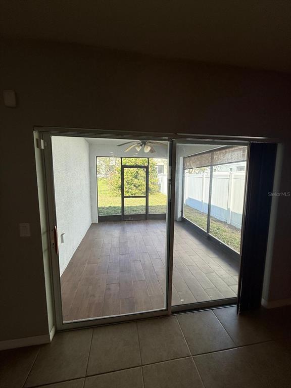 622 Samuel Place Davenport, FL 33837 - Photo 32 of 64 a view of an empty room with a window