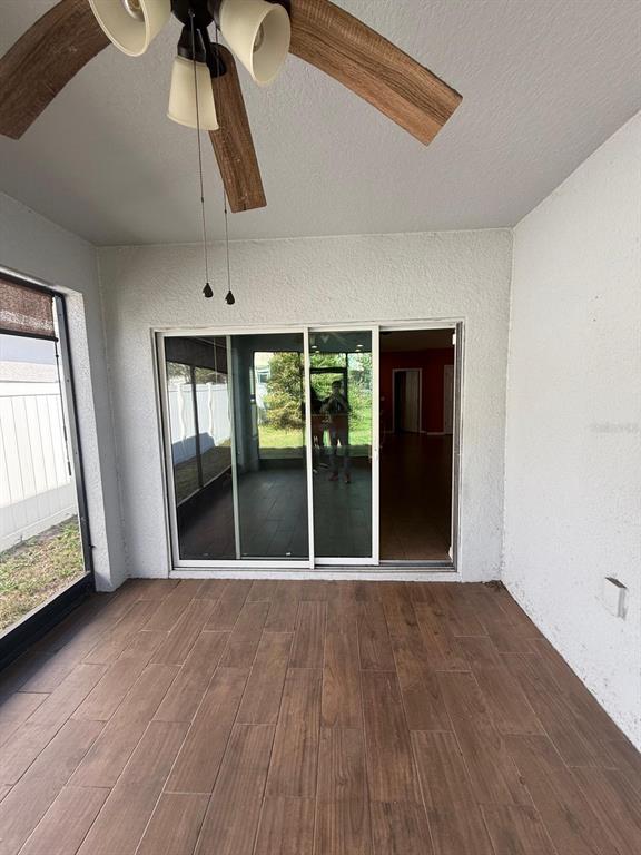 622 Samuel Place Davenport, FL 33837 - Photo 34 of 64 a view of an entryway with wooden floor