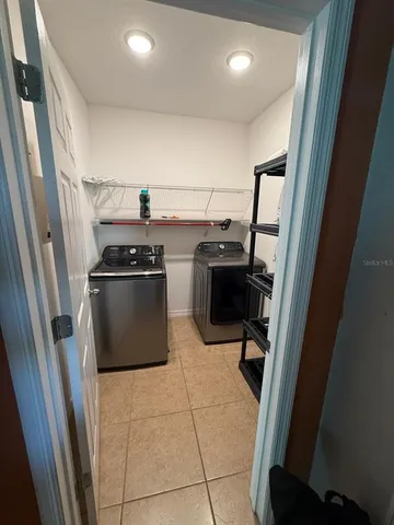 a bathroom with a sink a mirror and a bathtub