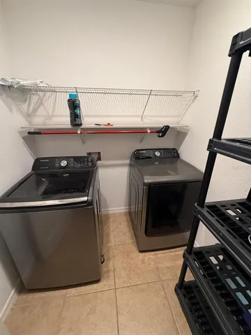 a room with rack and white doors