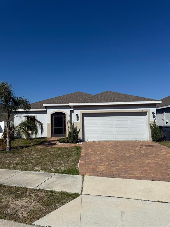 622 Samuel Place Davenport, FL 33837 - Photo 61 of 64 a view of a house with a patio