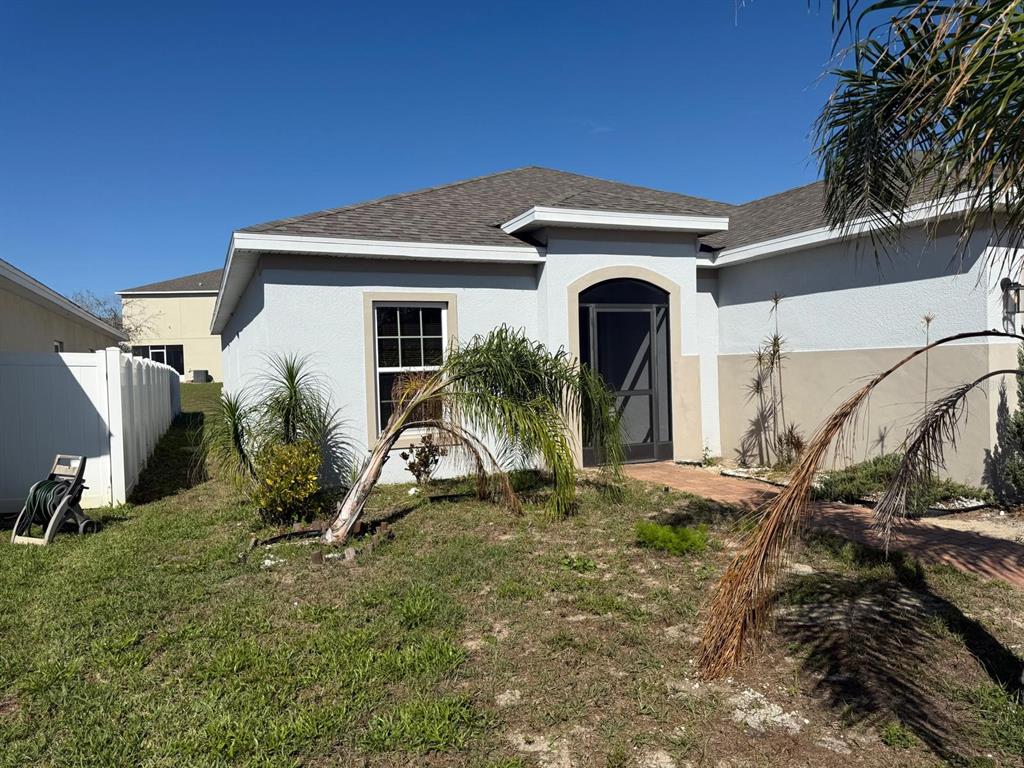 622 Samuel Place Davenport, FL 33837 - Photo 64 of 64 a view of a house with a yard