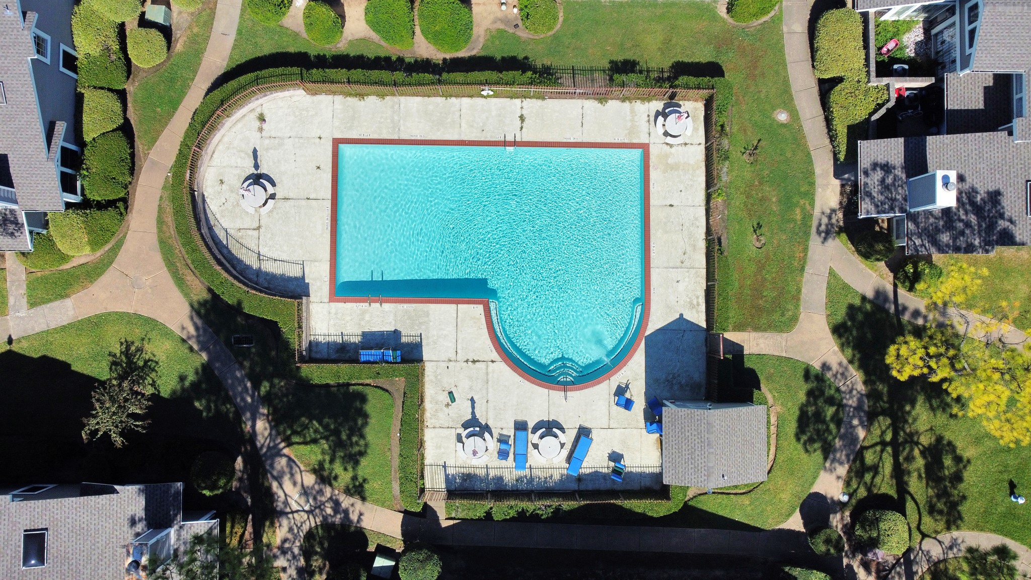 12232 Copper Tree Pvt Lane, Unit 122 Houston, TX 77035 - Photo 1 of 41 an aerial view of a fireplace with lots of potted plants