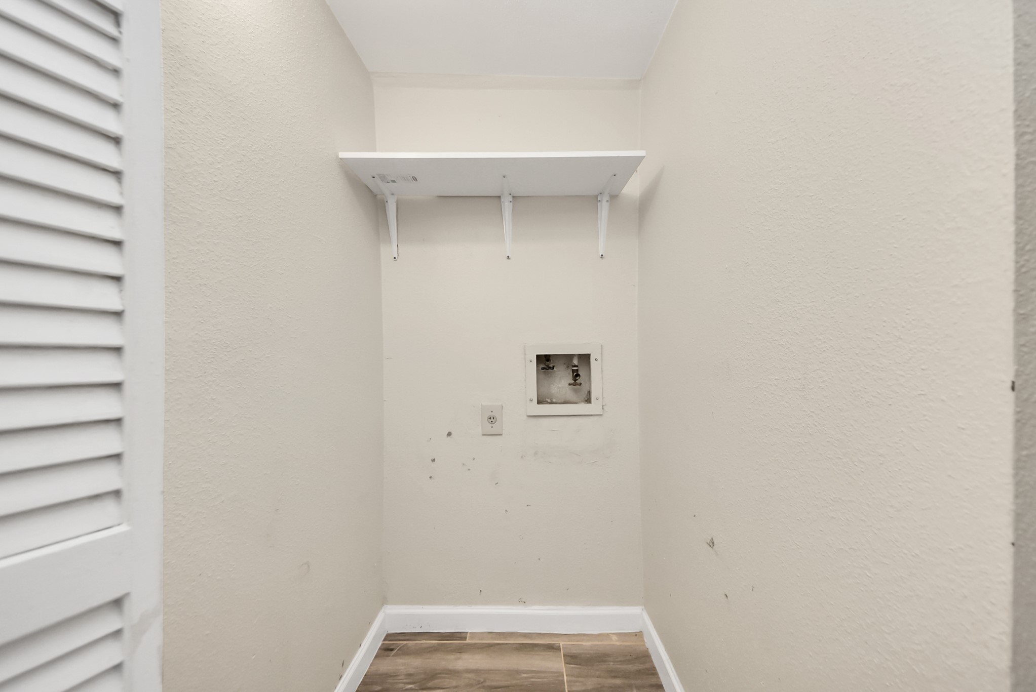 12232 Copper Tree Pvt Lane, Unit 122 Houston, TX 77035 - Photo 18 of 41 a view of utility room