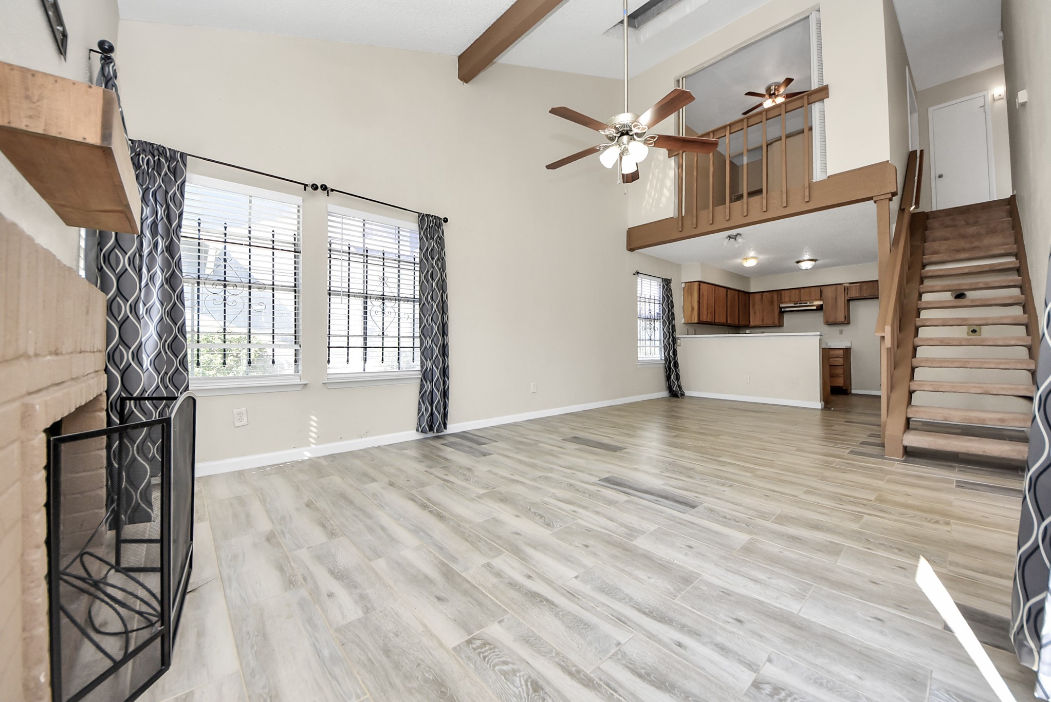 12232 Copper Tree Pvt Lane, Unit 122 Houston, TX 77035 - Photo 3 of 41 a view of an entryway with wooden floor