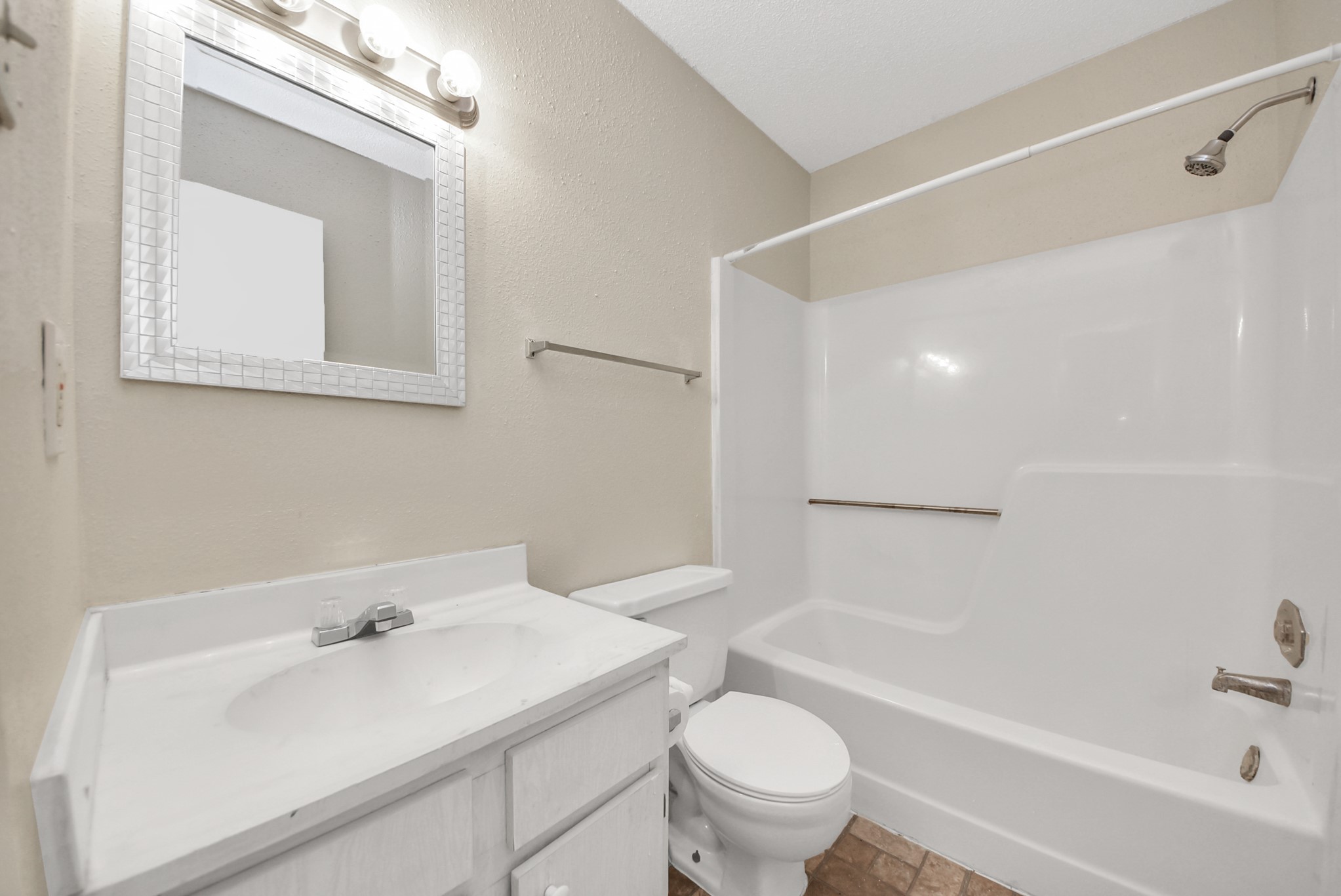 12232 Copper Tree Pvt Lane, Unit 122 Houston, TX 77035 - Photo 37 of 41 a bathroom with a sink mirror toilet and bathtub