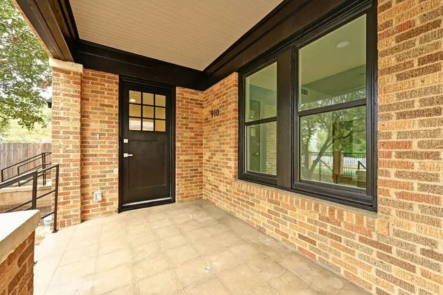 a view of a door and a yard