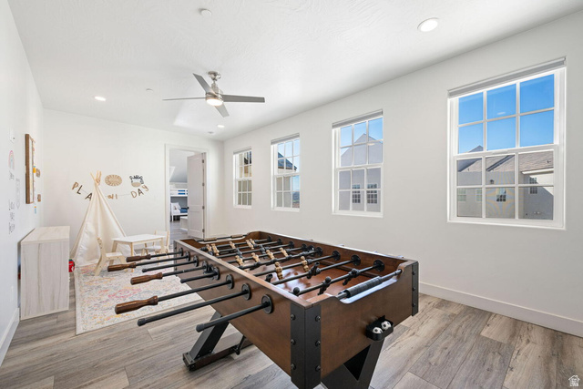 4281 Canterbury Road Hurricane, UT 84737 - Photo 13 of 24 Entertainment room featuring wood-finish flooring, recessed lighting, and a contemporary ceiling fan