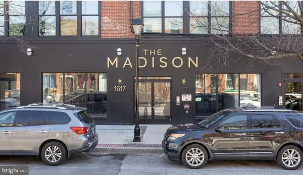a car parked in front of a building