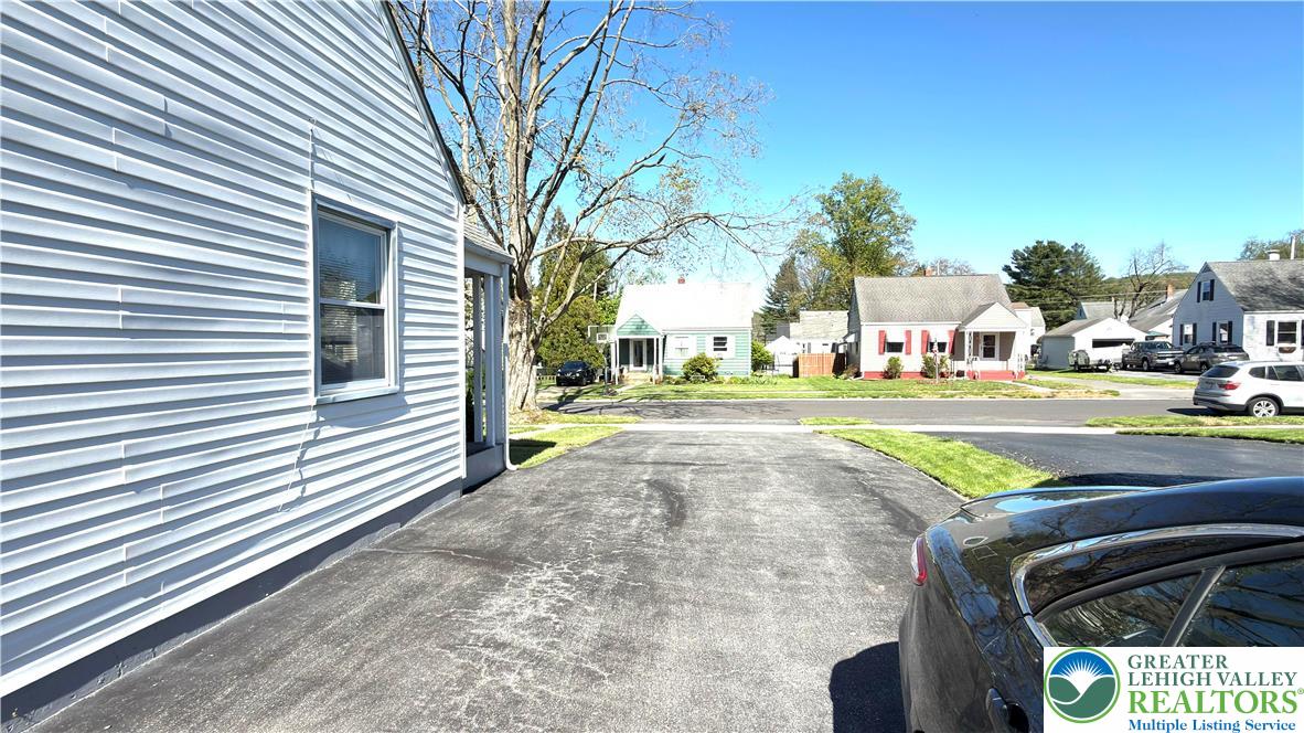 462 Maple Road Hellertown, PA 18055 - Photo 7 of 25 a view of a street with houses on both side of the road