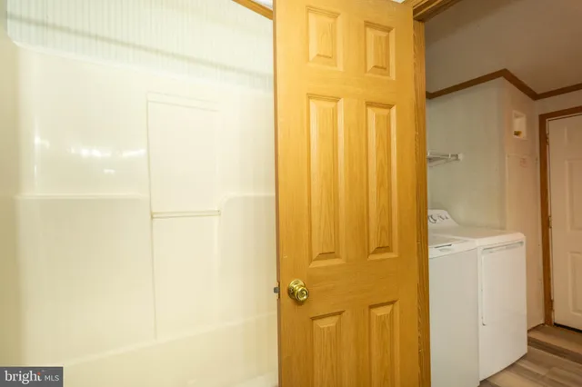 a bathroom with a glass door