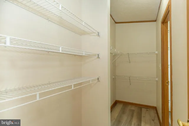 a view of small space with racks on the wall