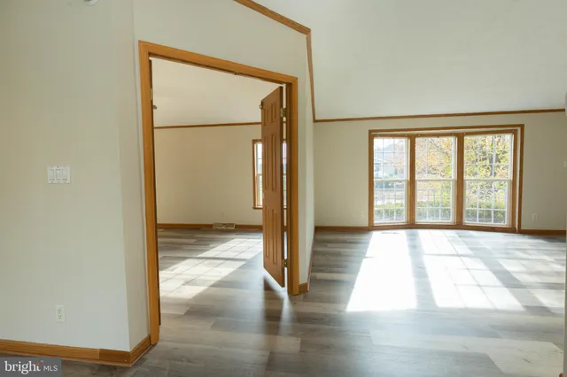 a view of an empty room and window