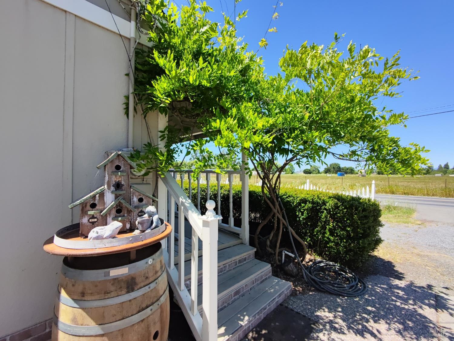 148 Millbrae Avenue Santa Rosa, CA 95407 - Photo 6 of 29 a view of a balcony with lake view and a potted plant